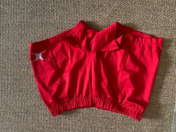 Selling with online payment: Red Gilbert Netball shorts - size 10/S