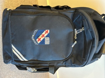 Selling with online payment: Crested navy rucksack
