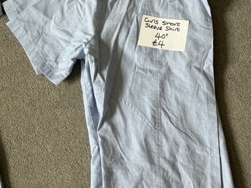 Selling with online payment: Good condition girls short sleeve blue shirt 40" £4 